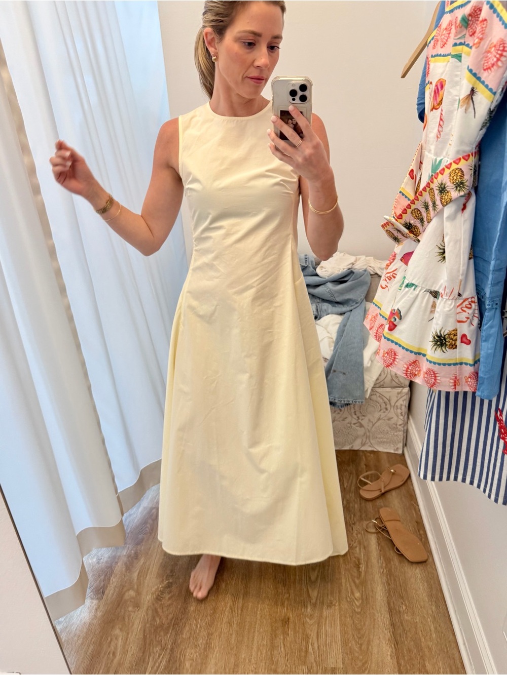 Pale Yellow High-Low Sleeveless Dress.